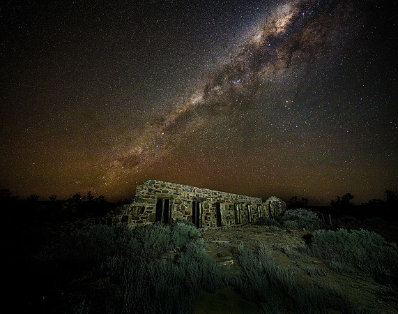 Dark Emu (upside down), Southern Cross & Milky Way above old woolshed at Witchelina Nature Reserve.